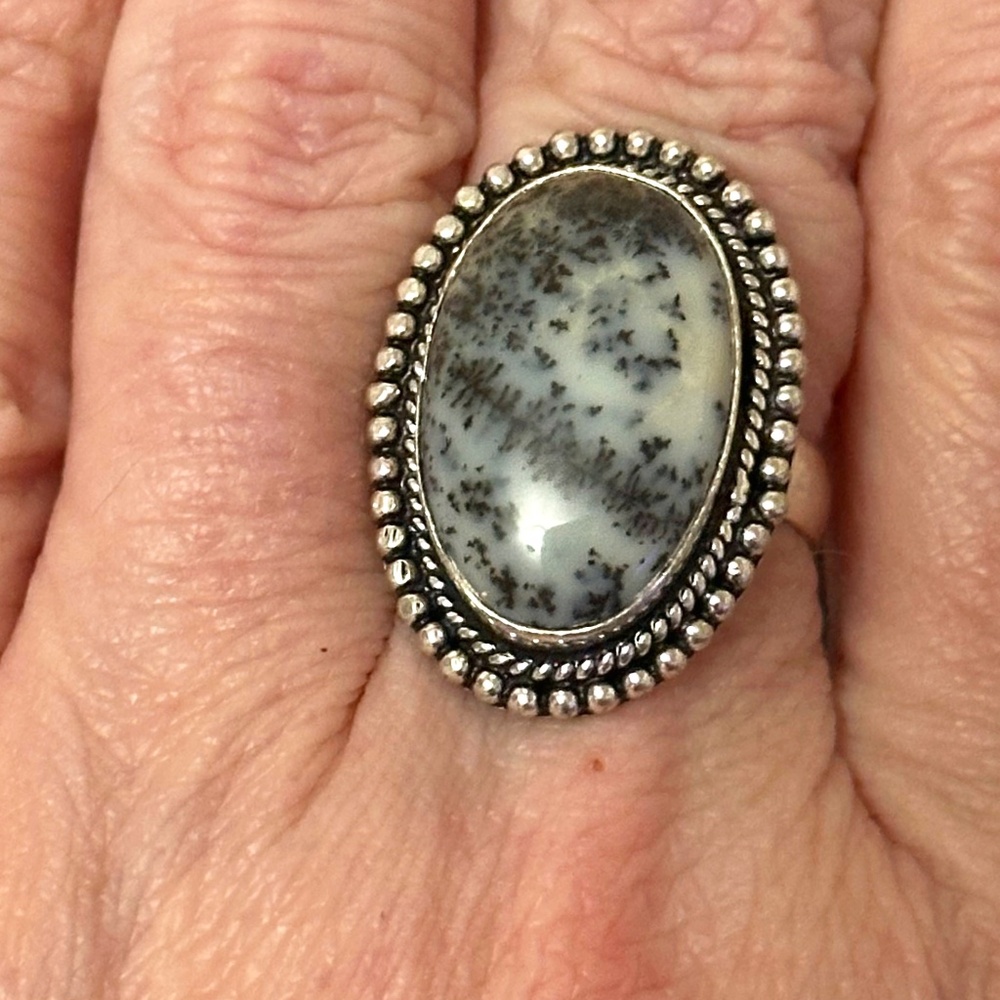 Stamped 925, large oval, dendritic agate ring. Gray w/black Inclusions Bezel set
